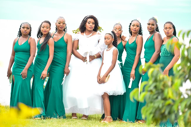 Group of women walking together outdoors during wedding photoshoot